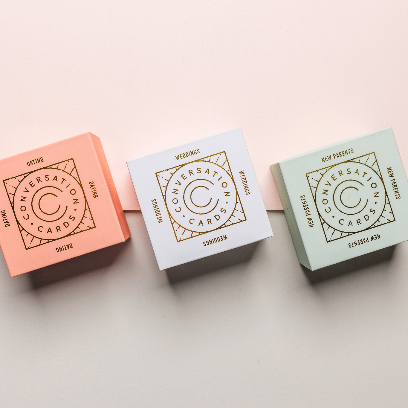 Conversation cards on a blush background